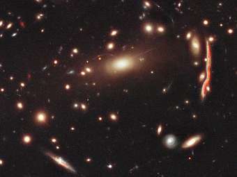   MACS J1206.2-0847.  NASA, ESA, M. Postman (STScI), and the CLASH Team 