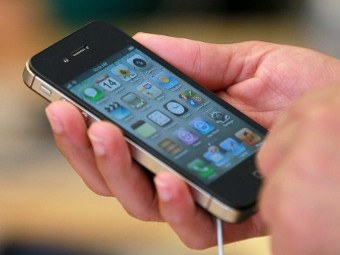 iPhone 4S,  ©AFP